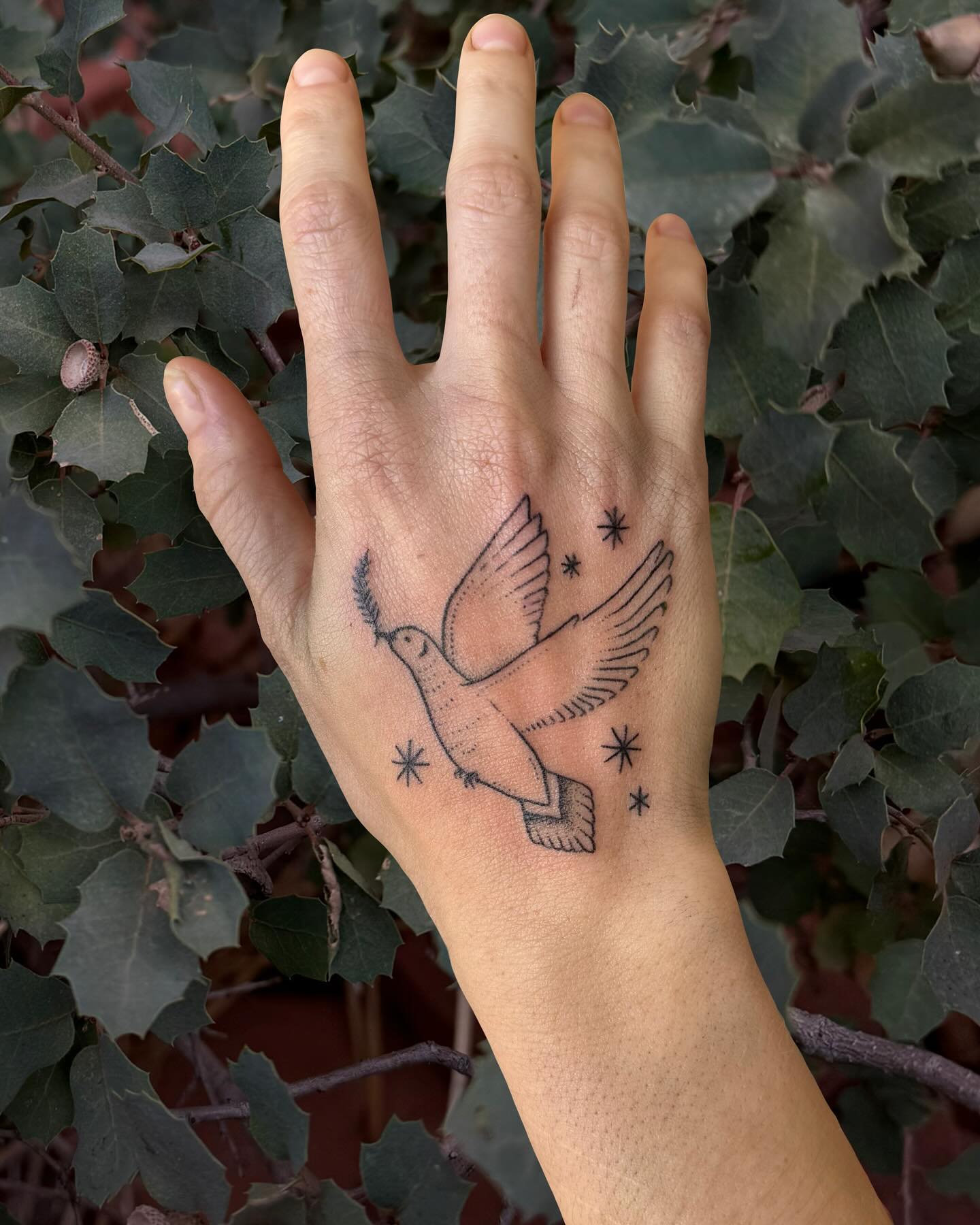 Minimalist Dove Tattoo