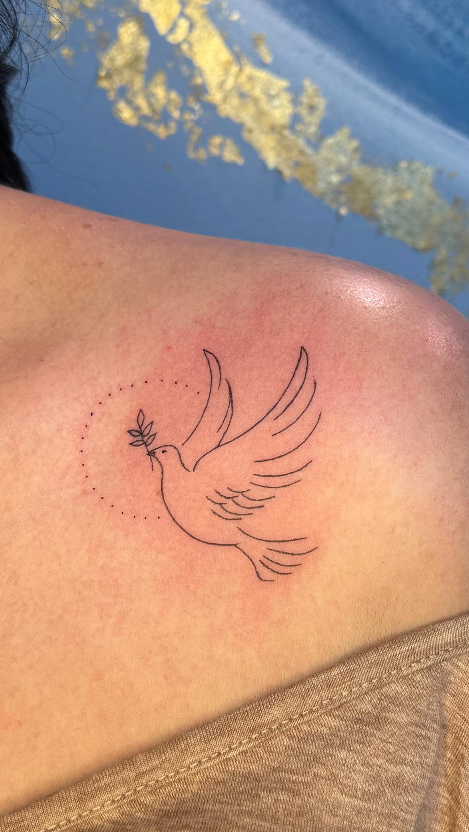 Minimalist Dove Tattoo