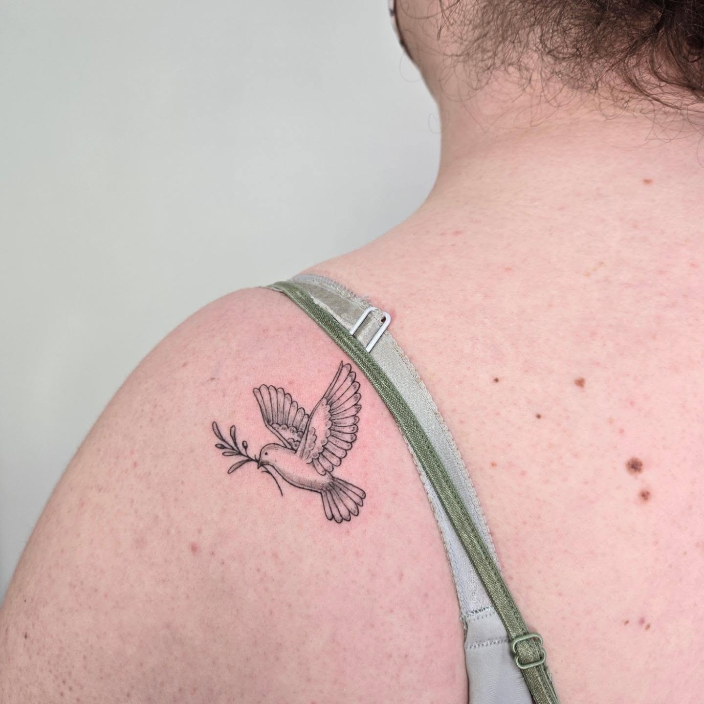 Minimalist Dove Tattoo