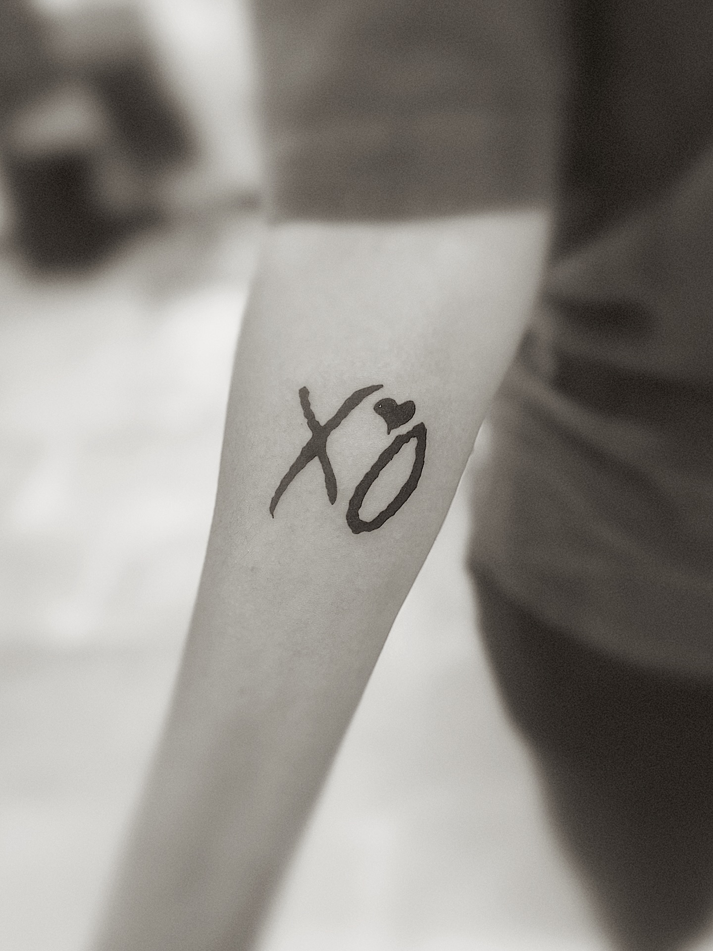 Minimalist XO Tattoo