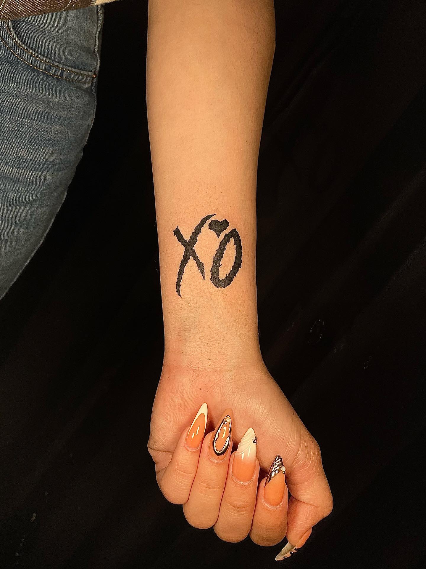 Minimalist XO Wrist Tattoo