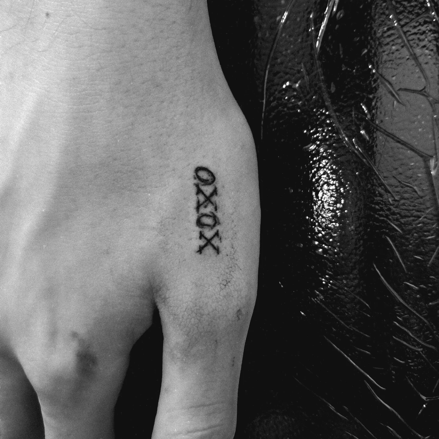 Minimalist XOXO Tattoo