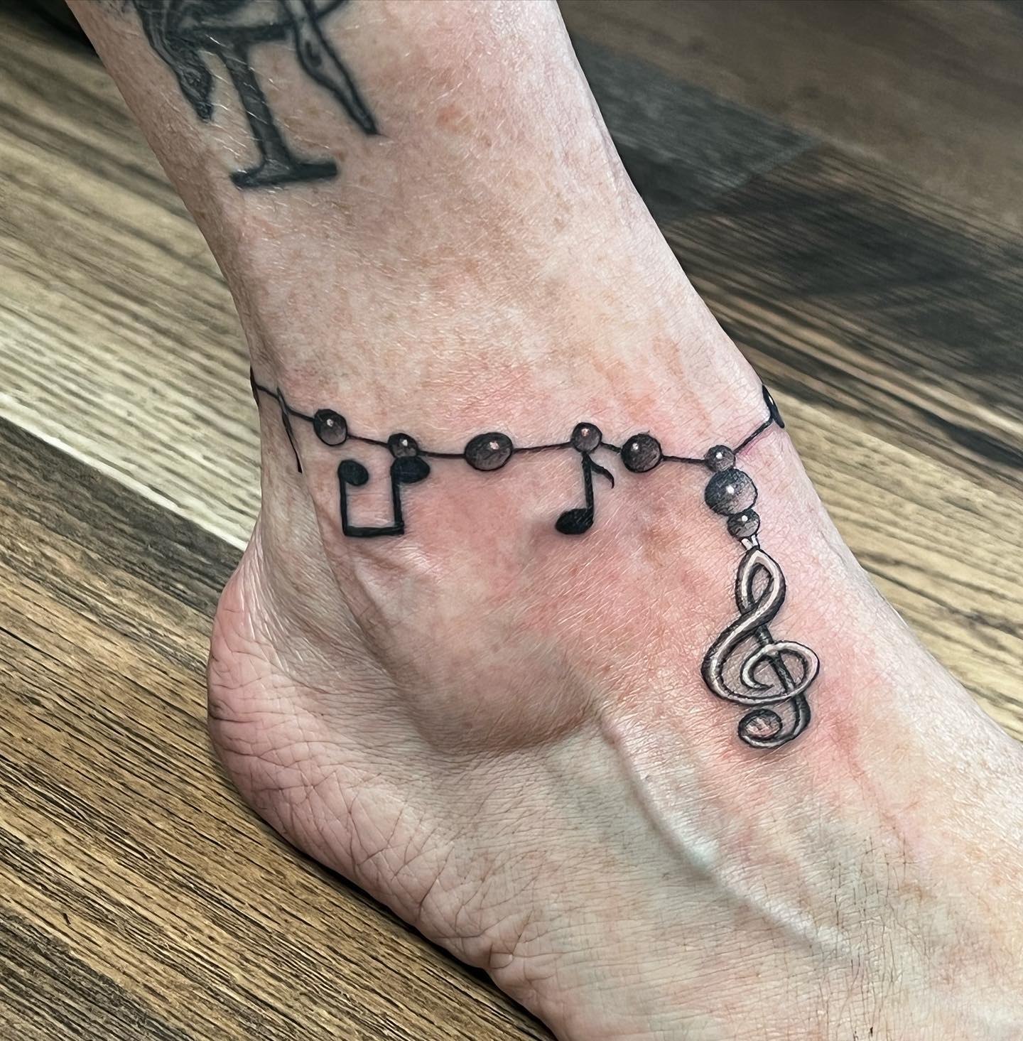 Musical Anklet Tattoo