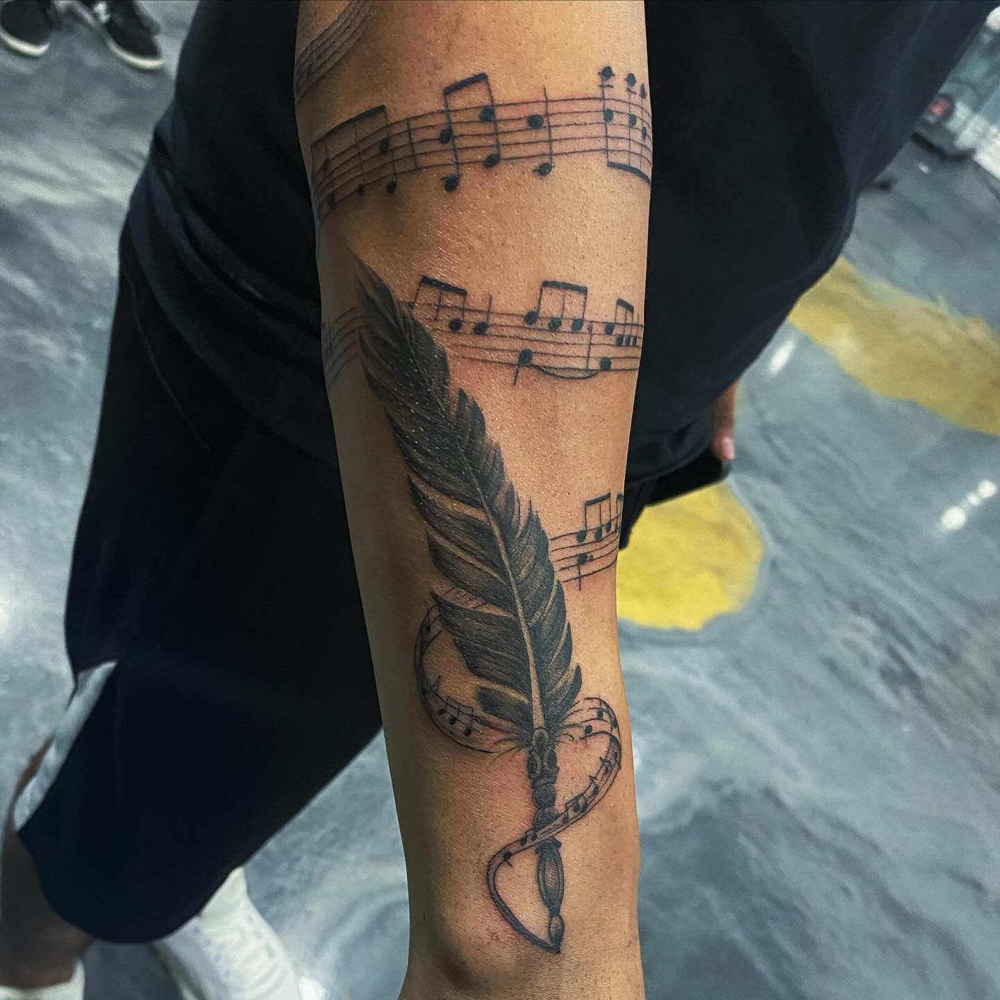 Musical Feather Tattoo