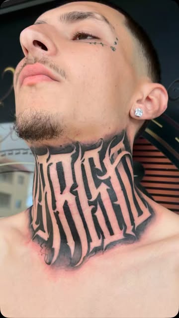 Neck Lettering Tattoo