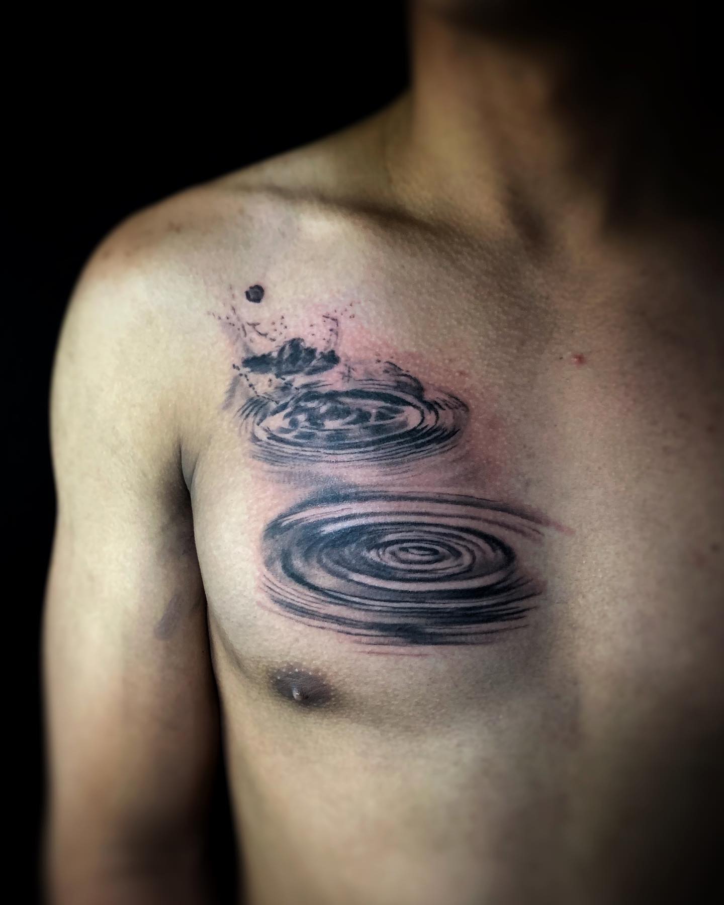 Oceanic Rock Tattoo