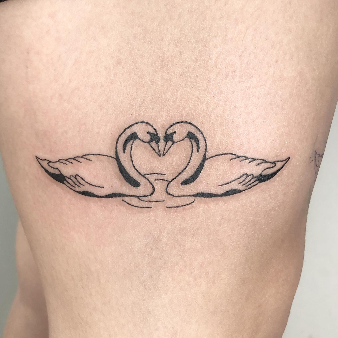 Tatuaje corazón compartido