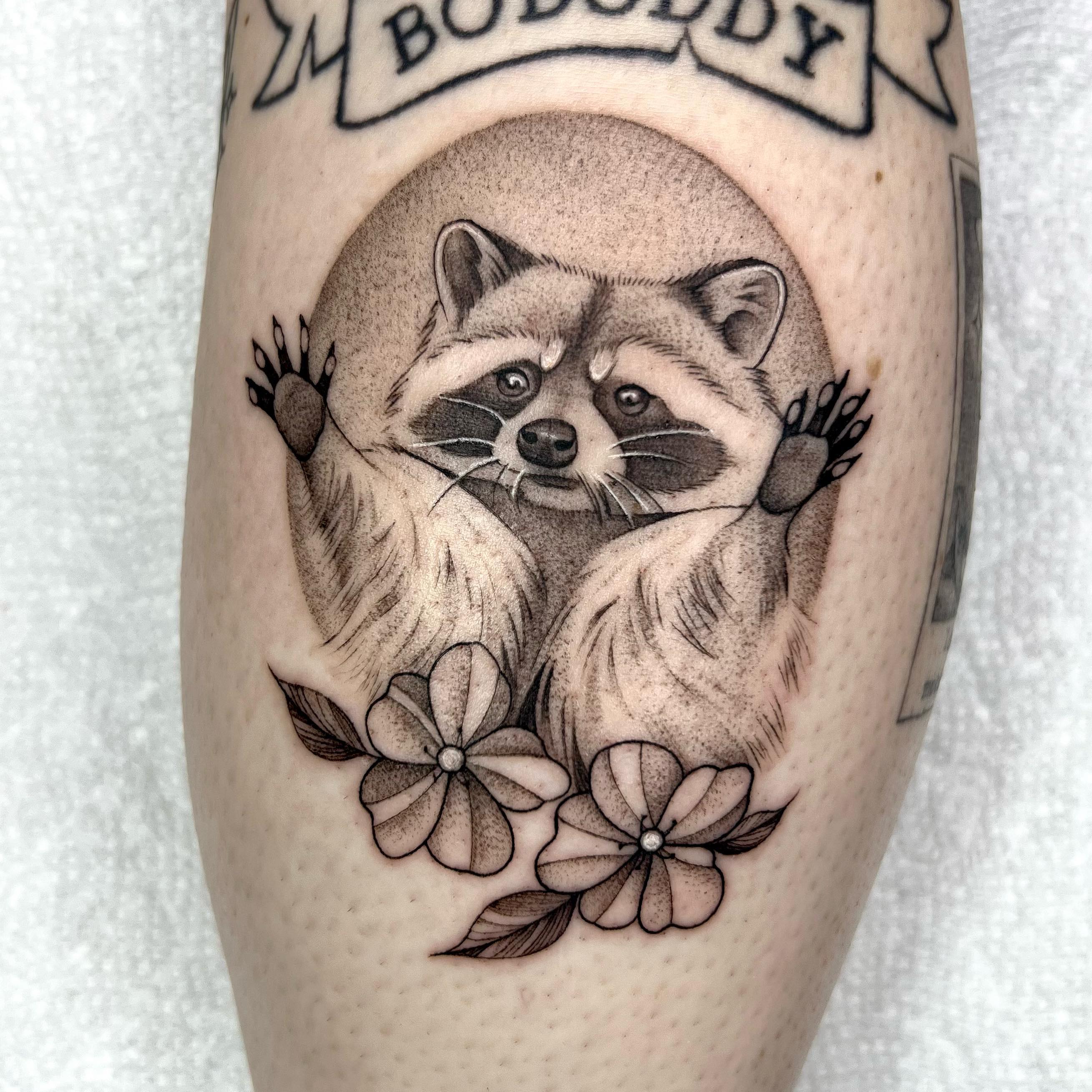 Playful Raccoon Charm