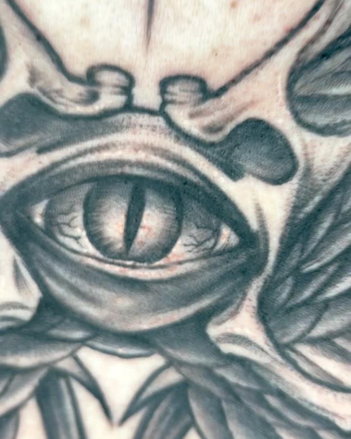 Realistic Cat Eye Chest Tattoo