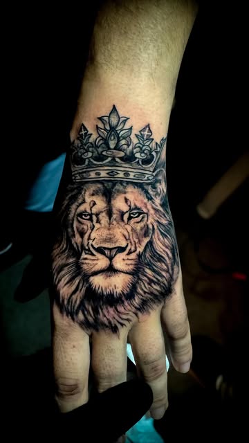 Rey León Mano