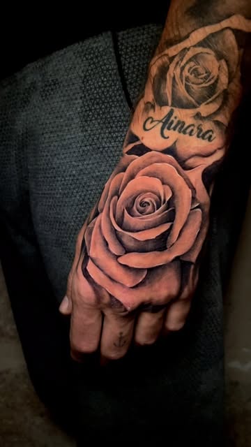Realistic Rose Hand Tattoo