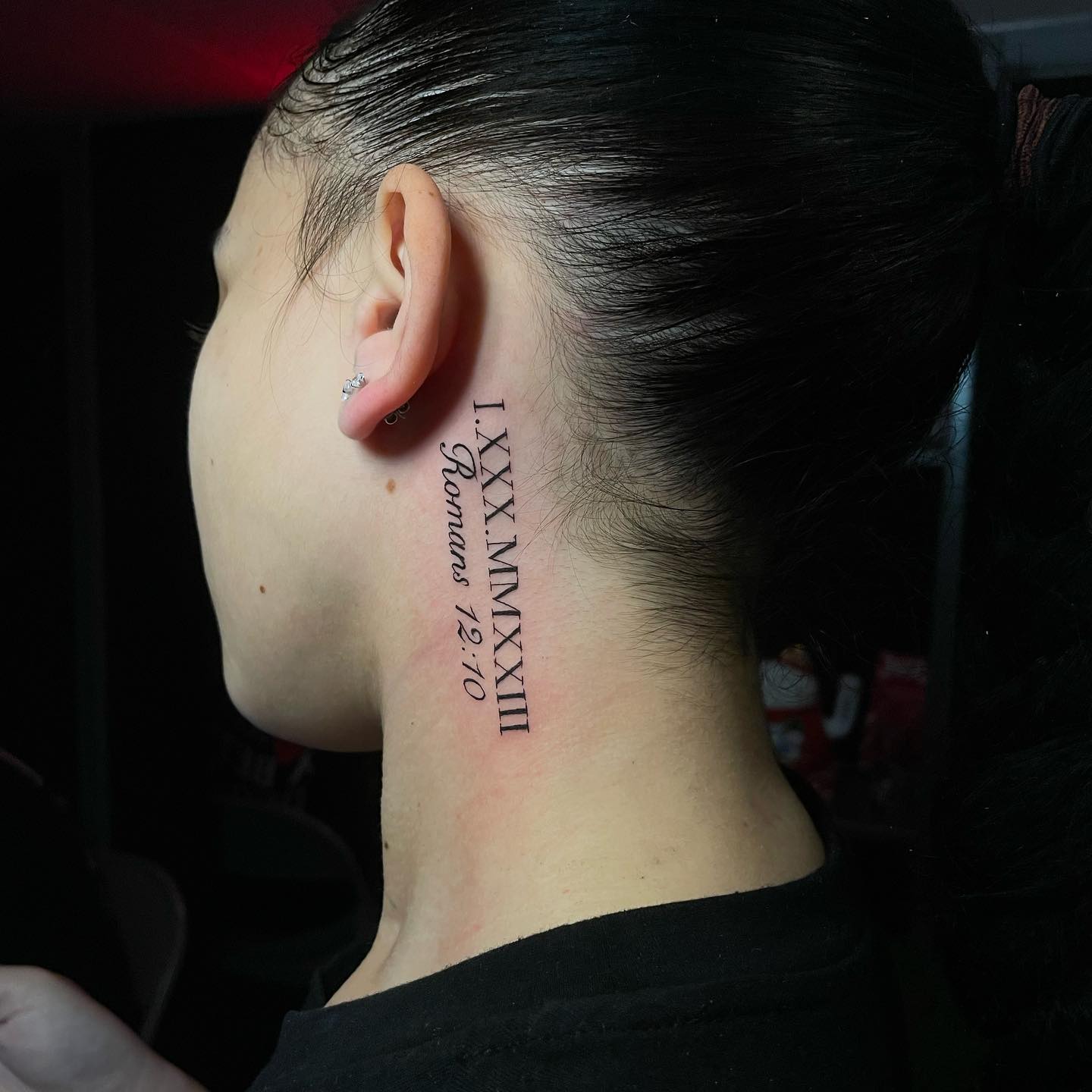 Roman Numerals Neck Tattoo
