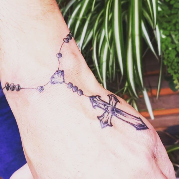 Rosary Cross Hand Tattoo