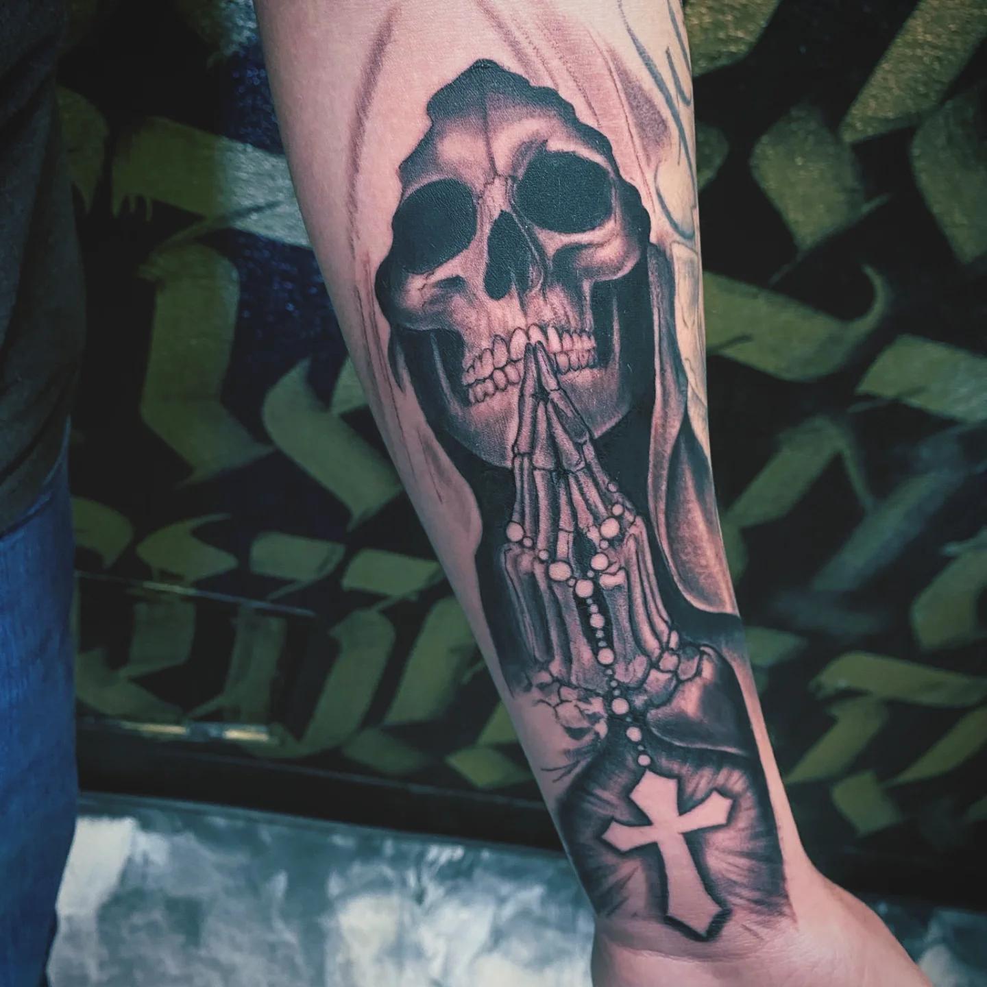 Santa Muerte Praying Tattoo