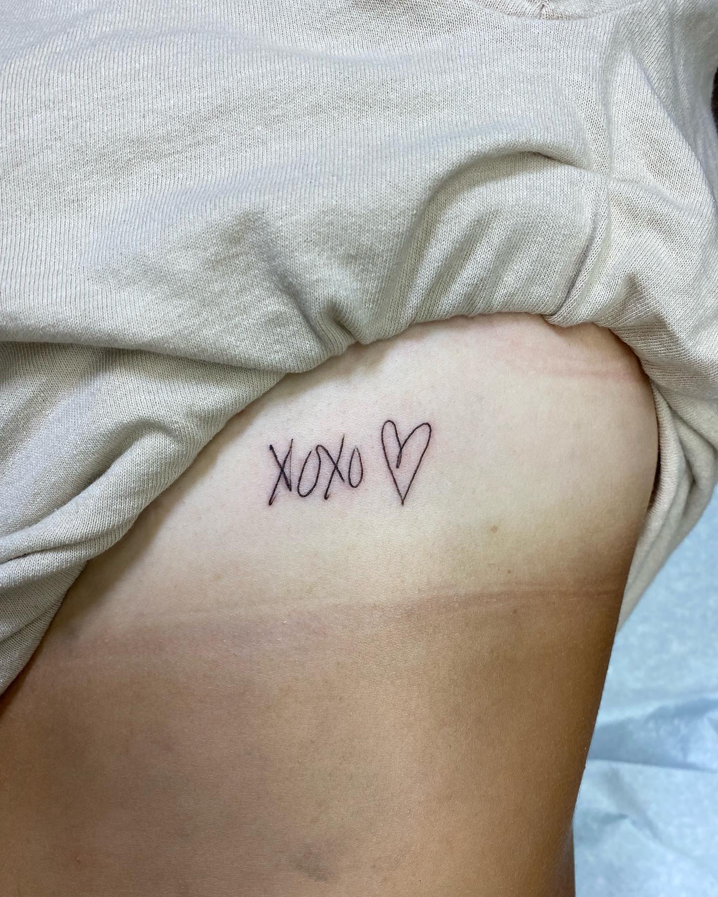 Simple XOXO Heart Tattoo