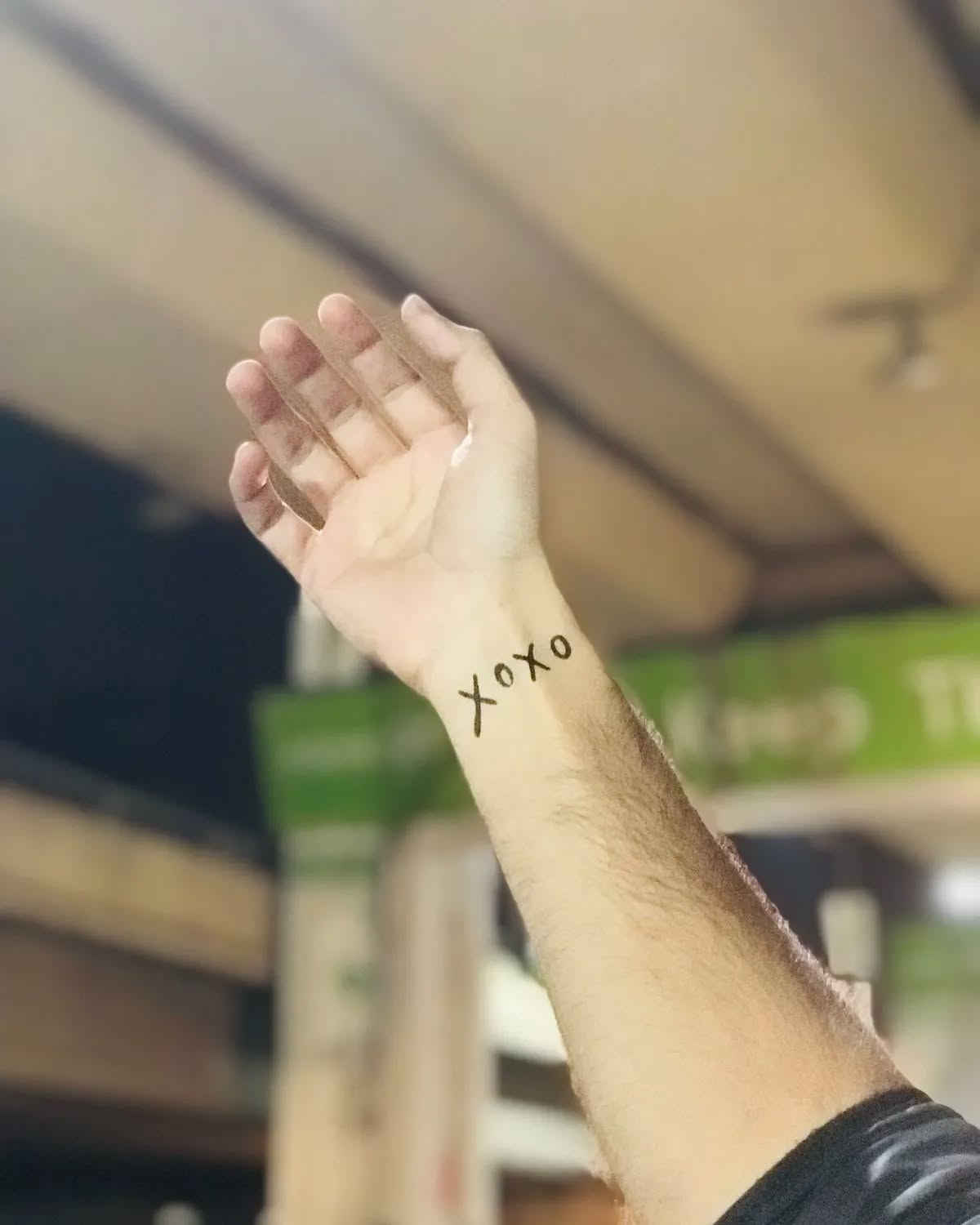 Simple XOXO Wrist Tattoo