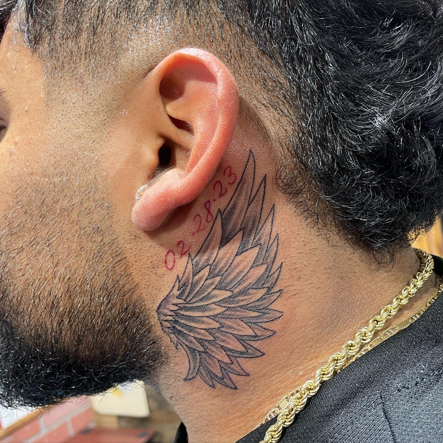 Stylized Angel Wing Tattoo