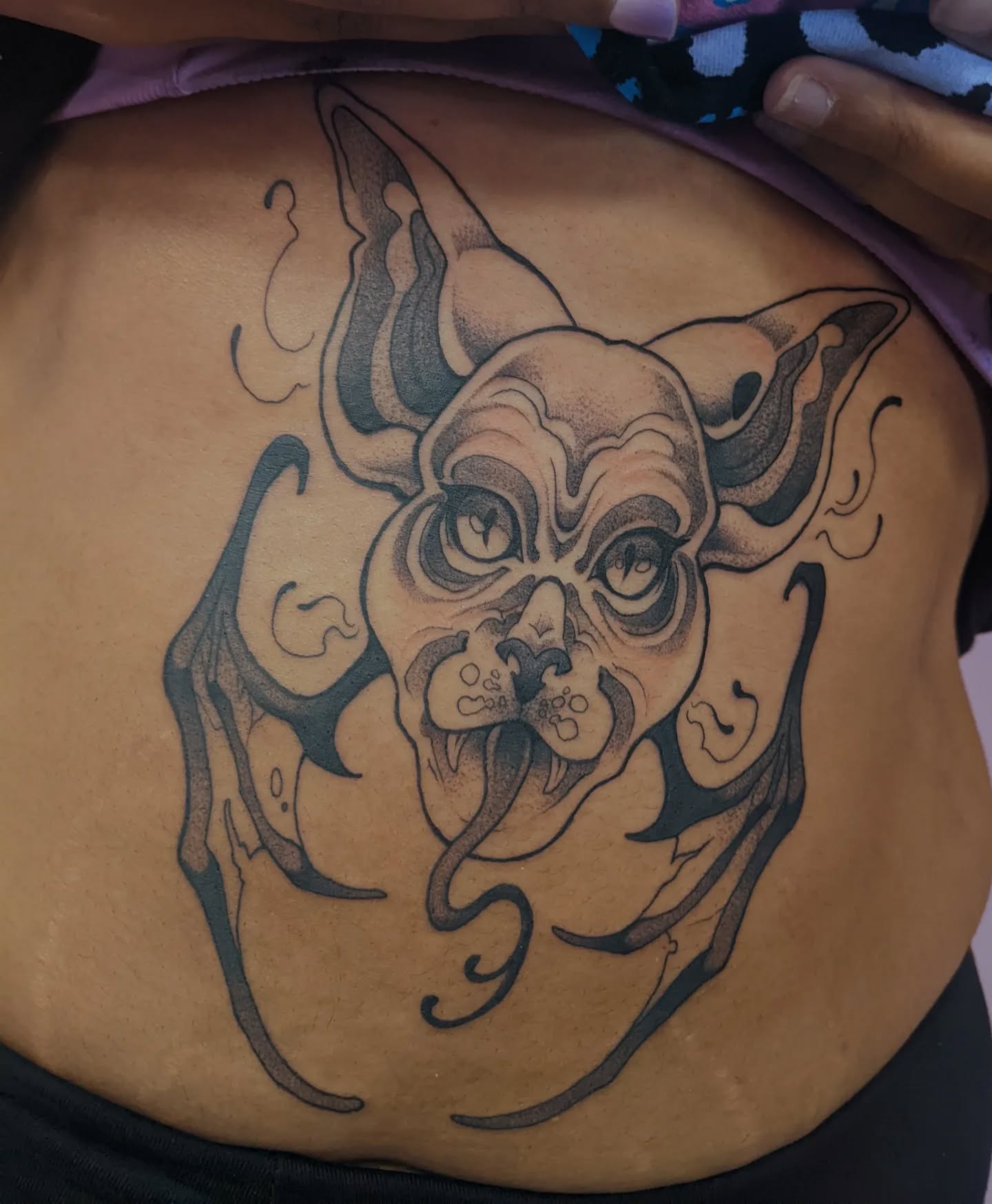 Stylized Cat Belly Tattoo