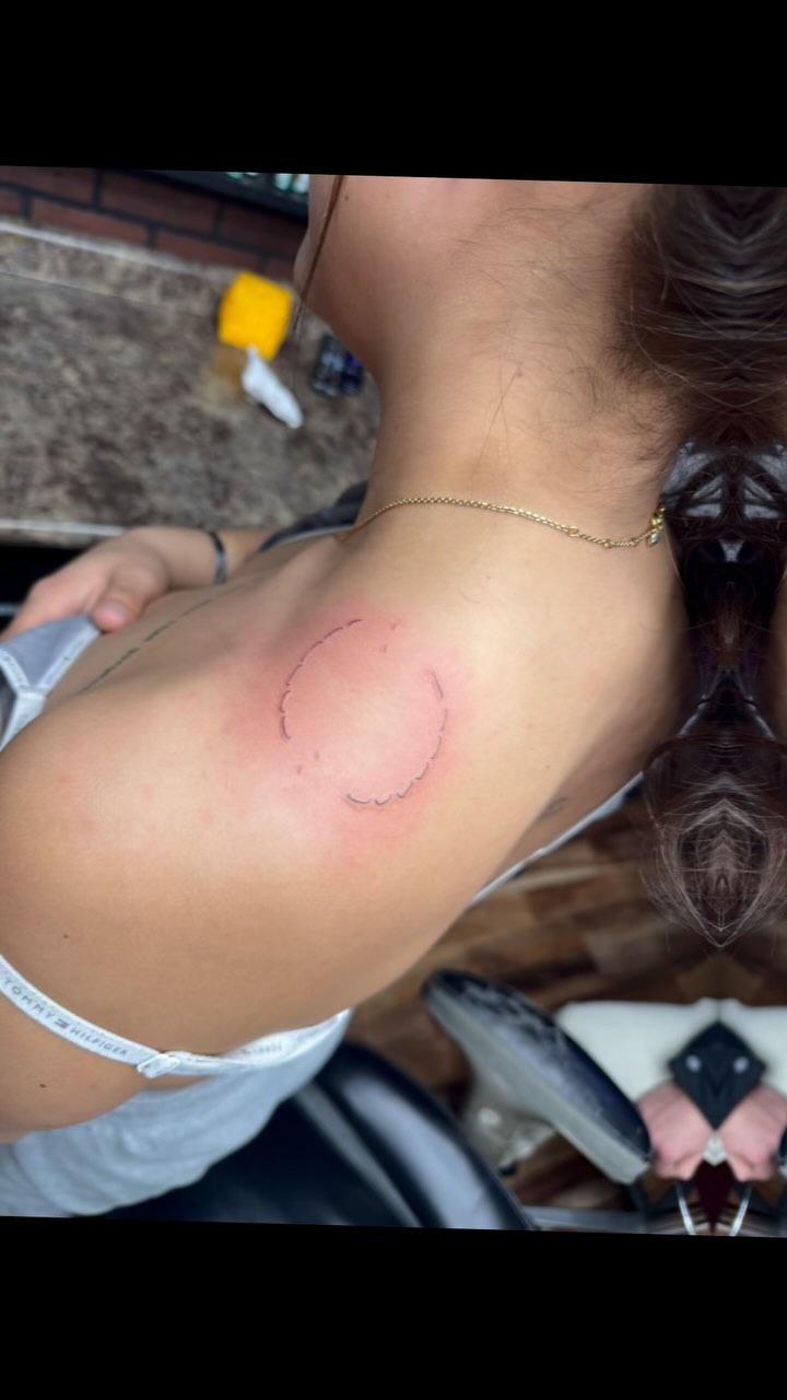 Subtle Bite Mark Tattoo