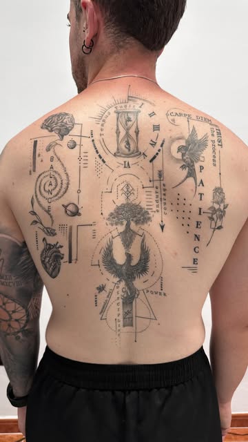 Symbolic Geometric Back Tattoo