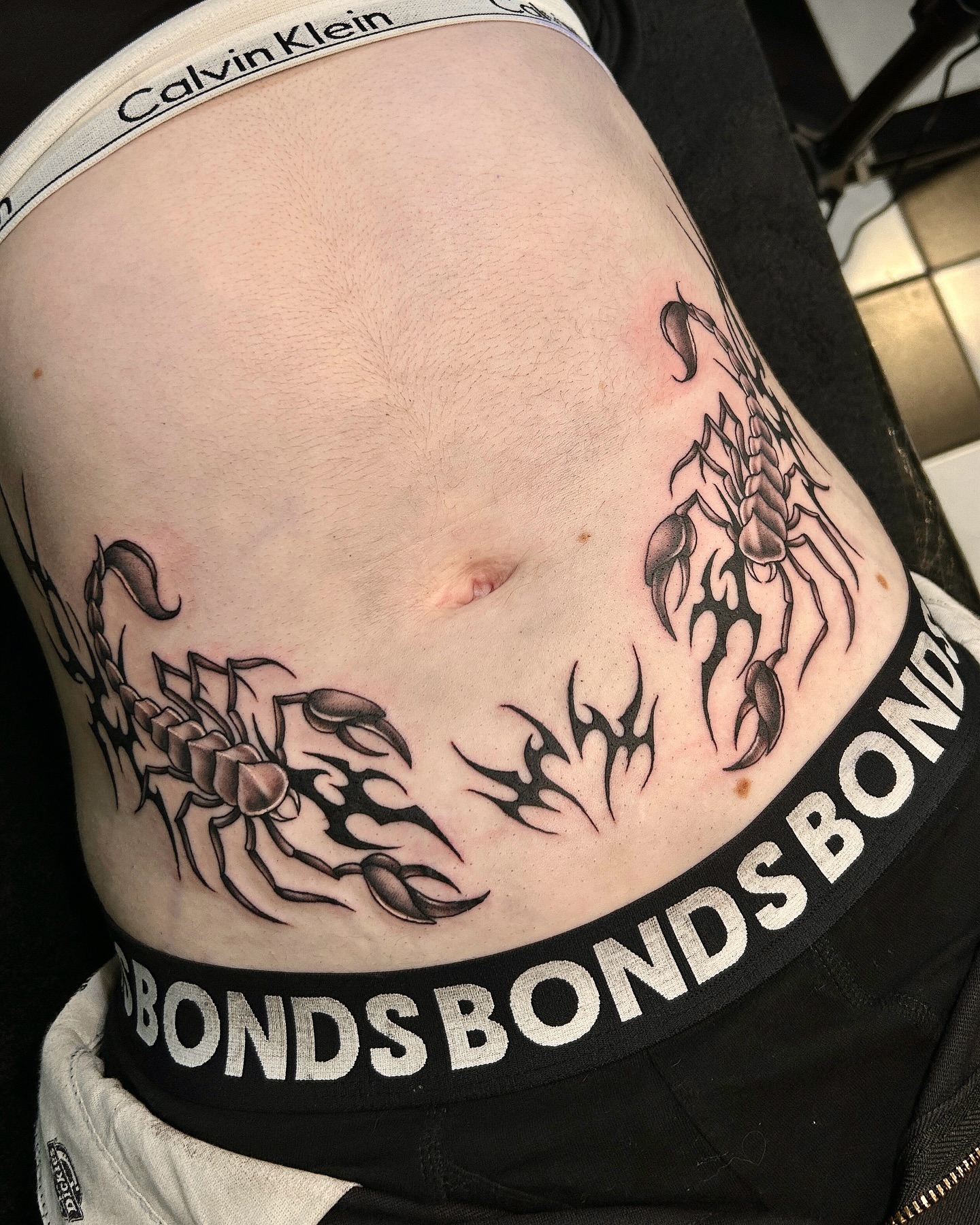 Symmetrical Scorpion Bottom Stomach Tattoo