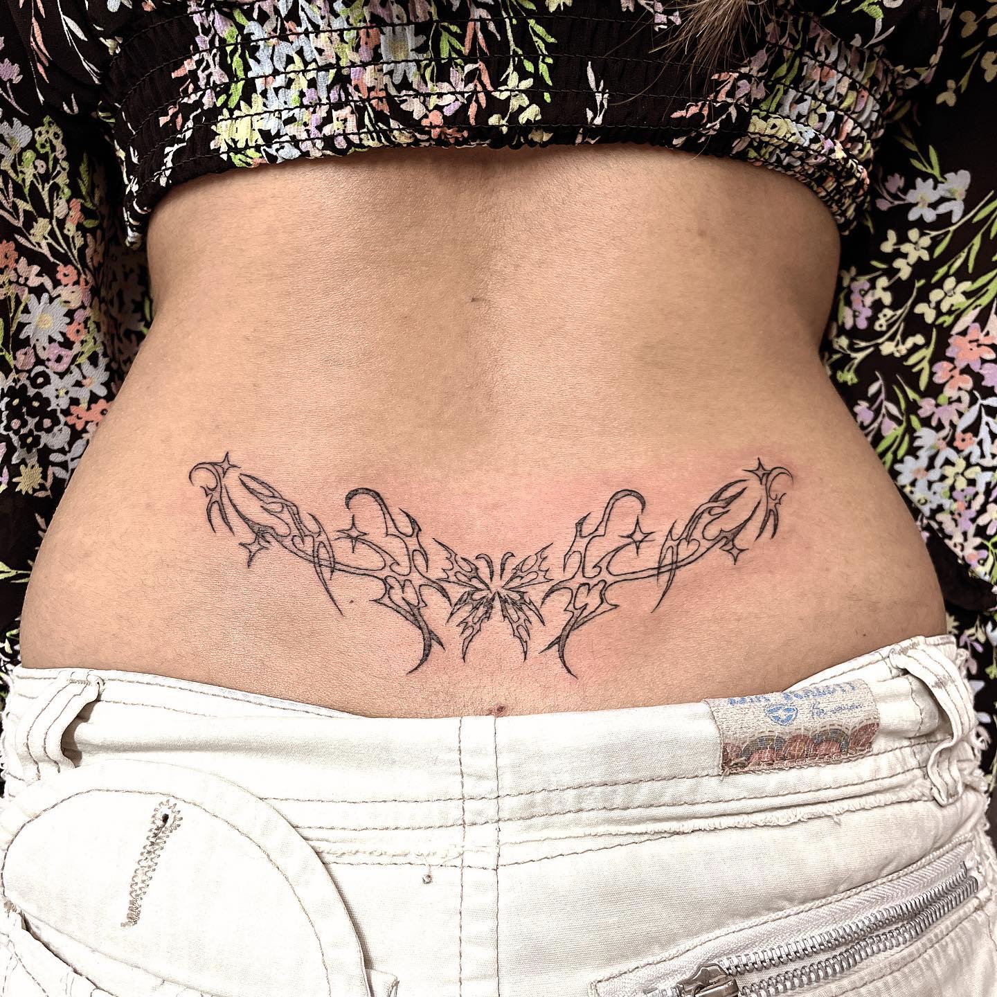 Symmetrical Tribal Tramp Stamp