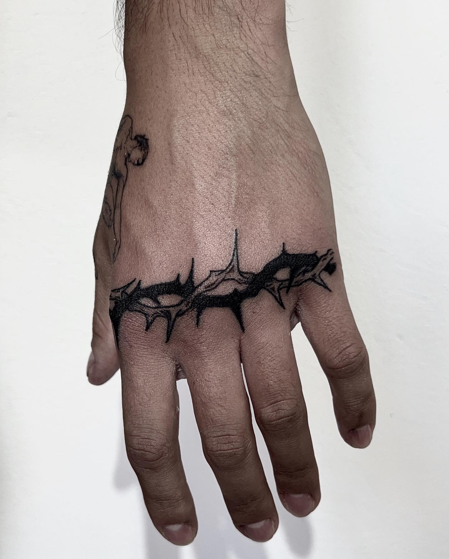 Thorny Band Hand Tattoo