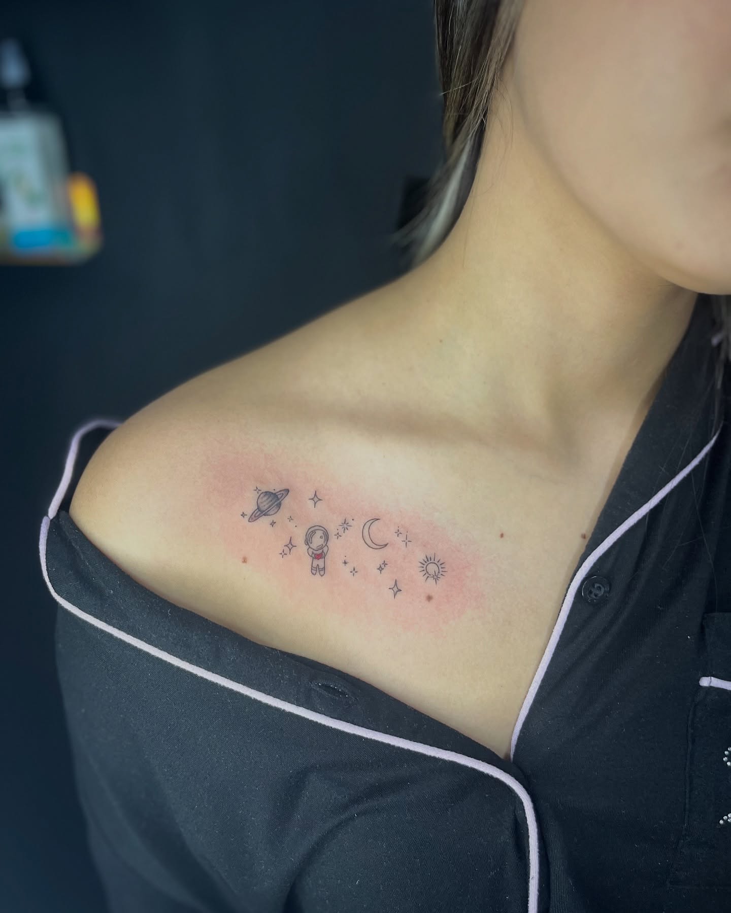 Tiny Space-Themed Tattoo