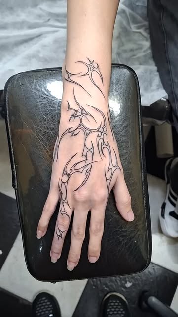 Tribal Hand Tattoo