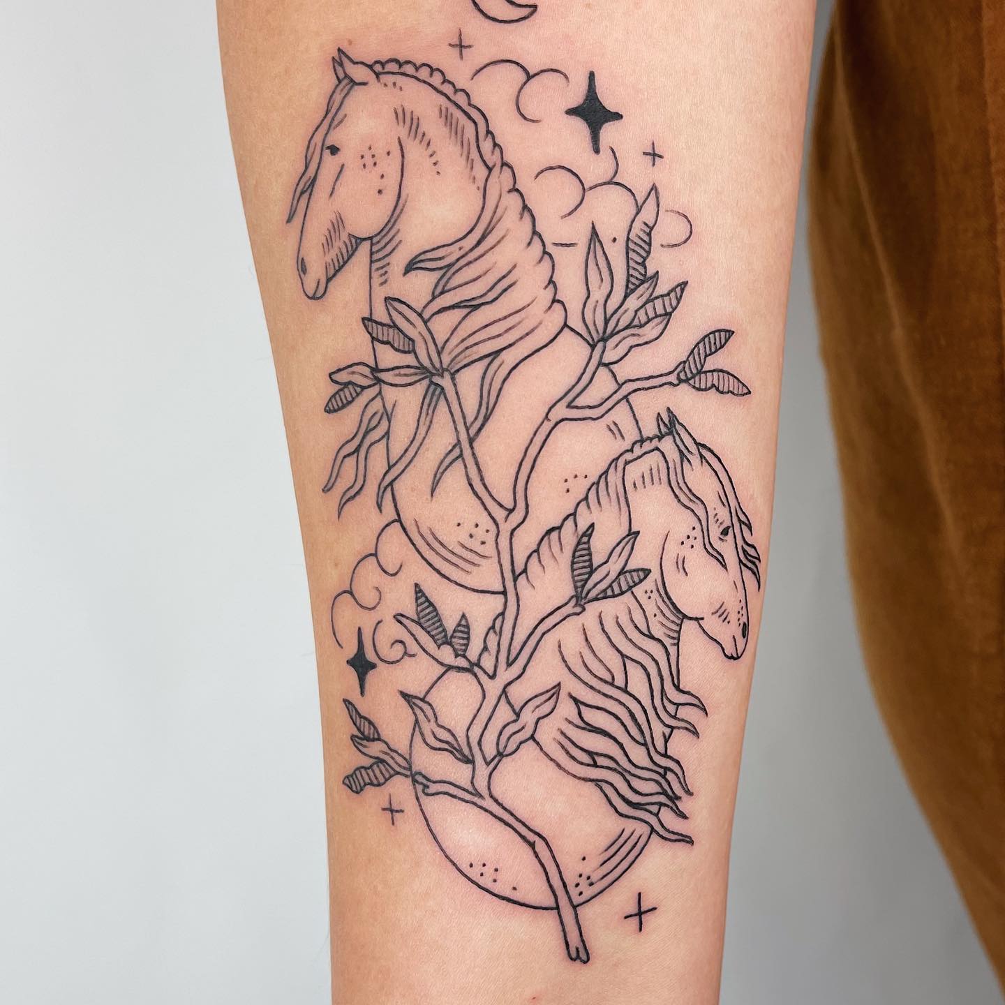 Twin Horses Bond Tattoo