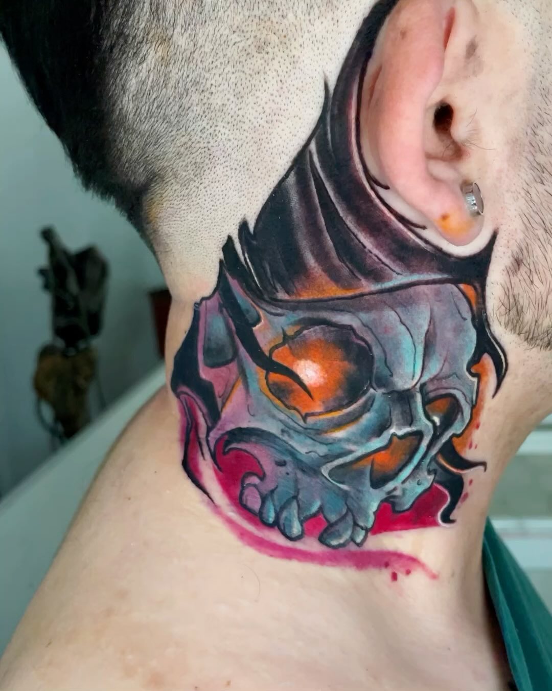 Vibrant Neck Skull Tattoo